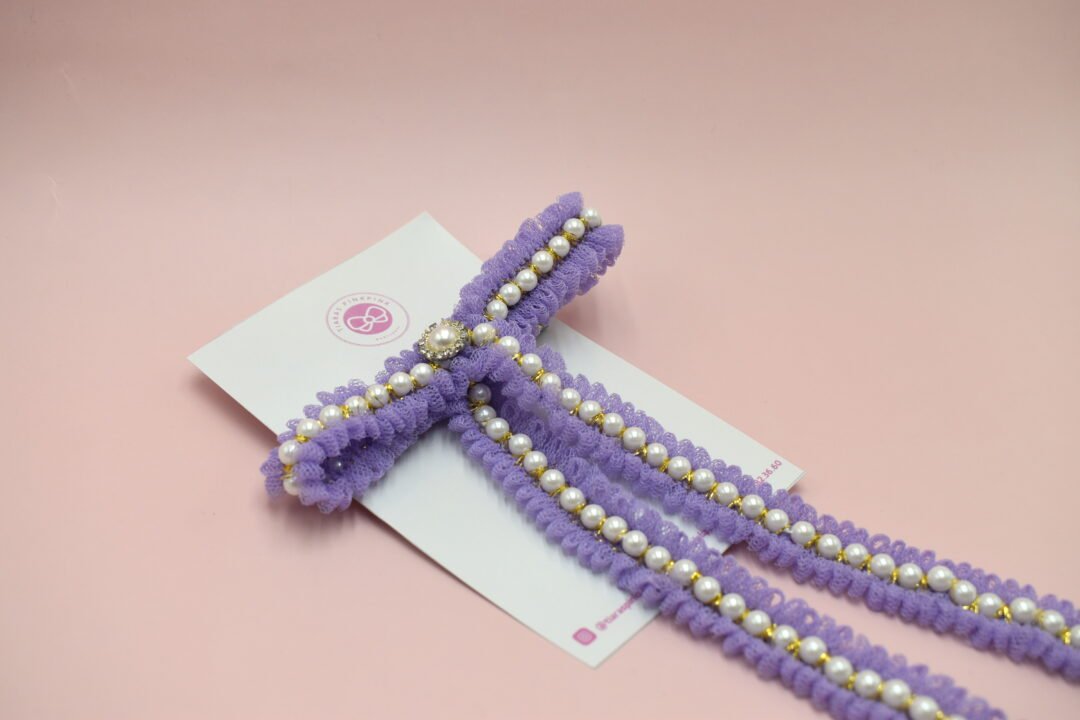 MOÑO PERLAS MORADO